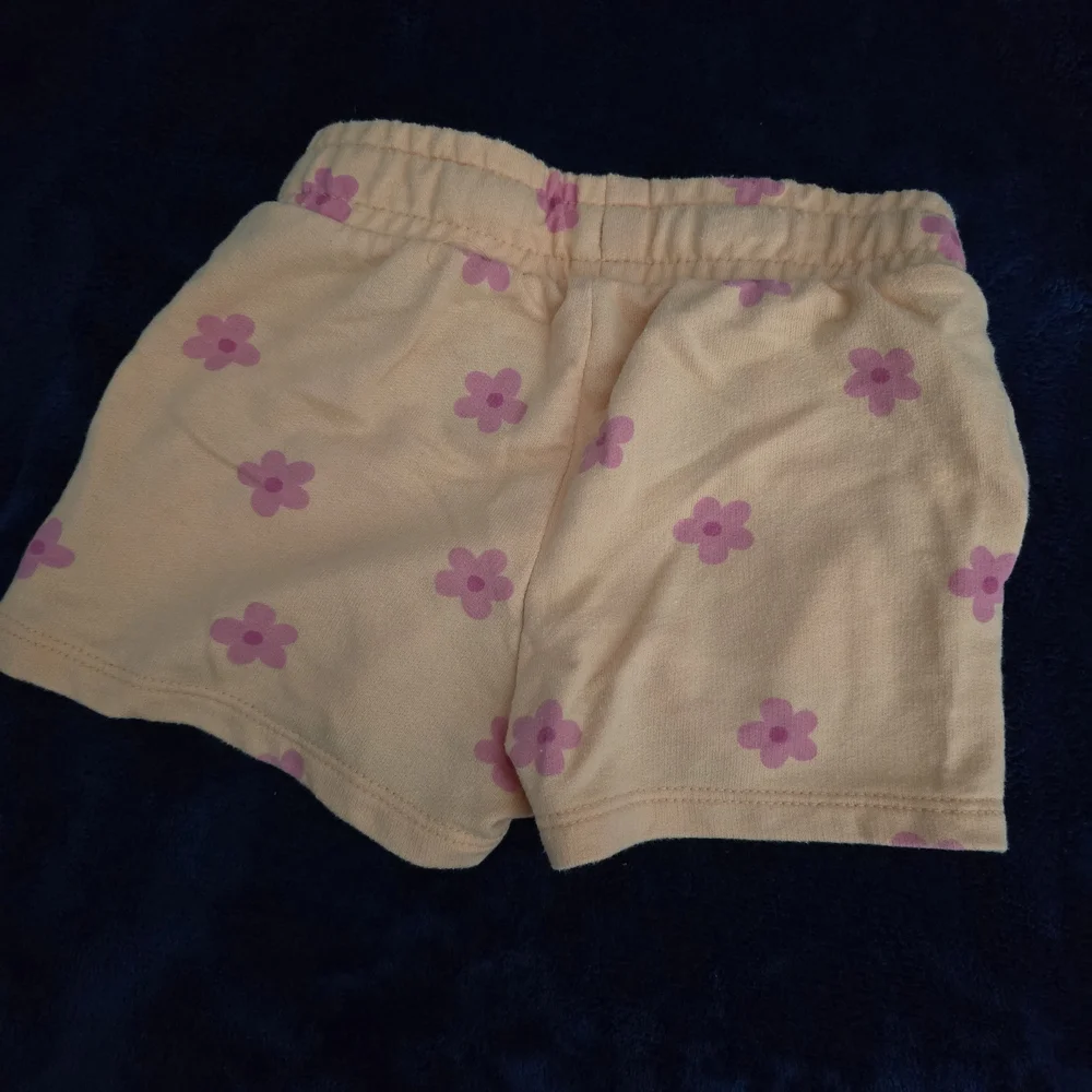 Cat & Jack Peach Shorts with Pink Flower Print
